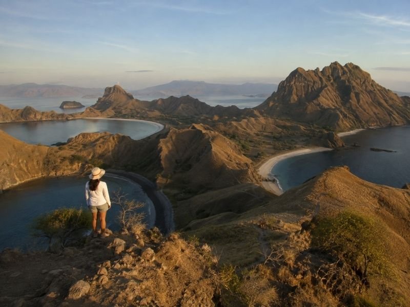 Padar Island things to do with a traveler overlooking the iconic three bays