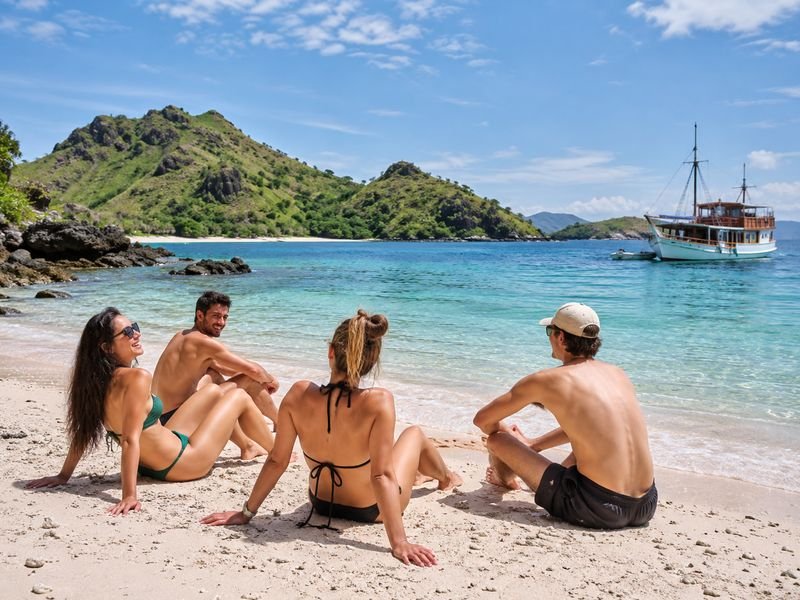 travelers enjoying an island stop near Labuan Bajo
